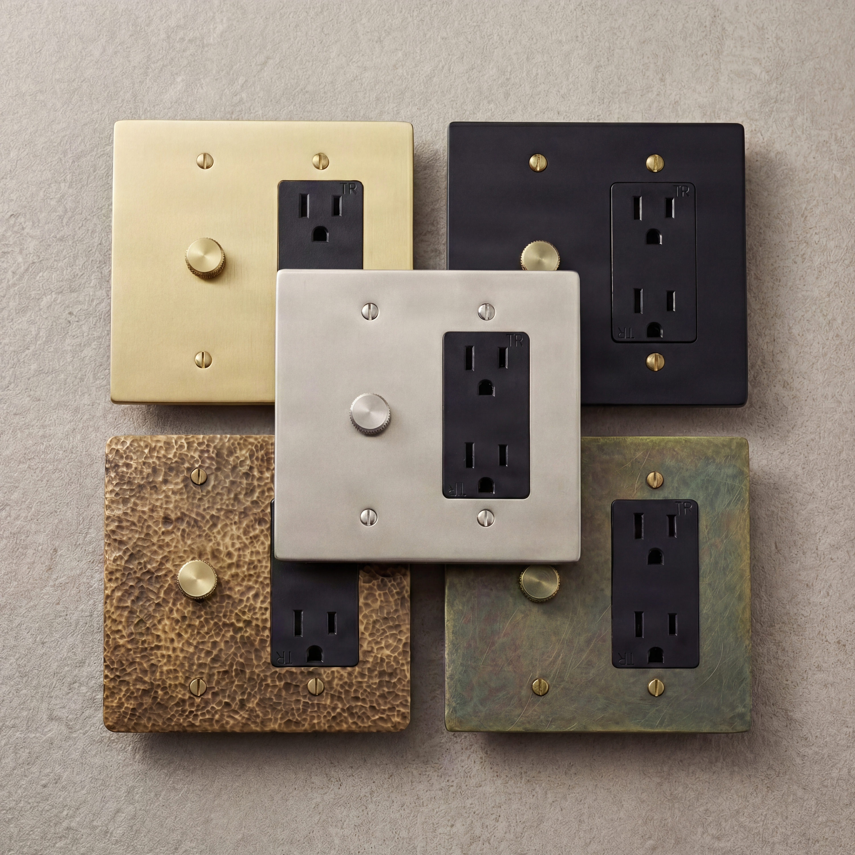 Luxury metal dimmer switches with knurled knobs, diverse finishes.