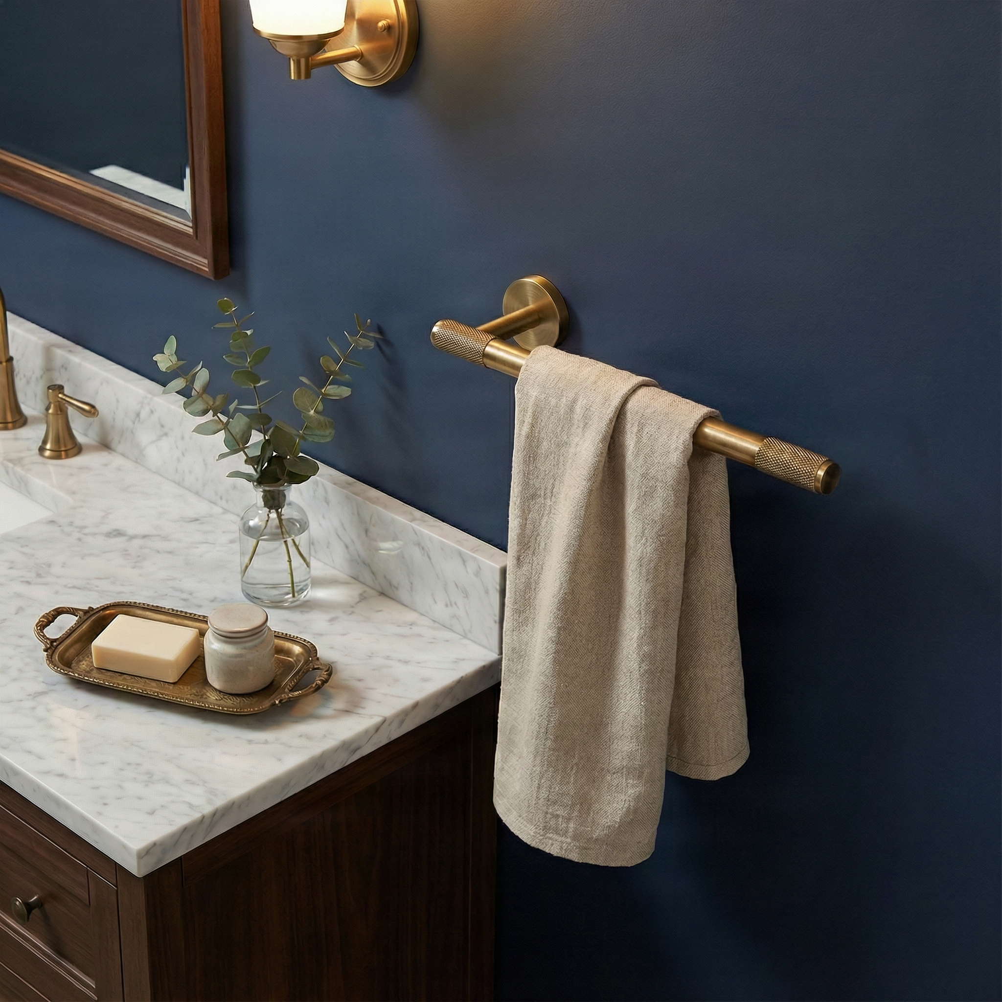 Refined bathroom with modern brass bathroom hardware 11 inch towel bar on a deep blue wall, marble vanity.