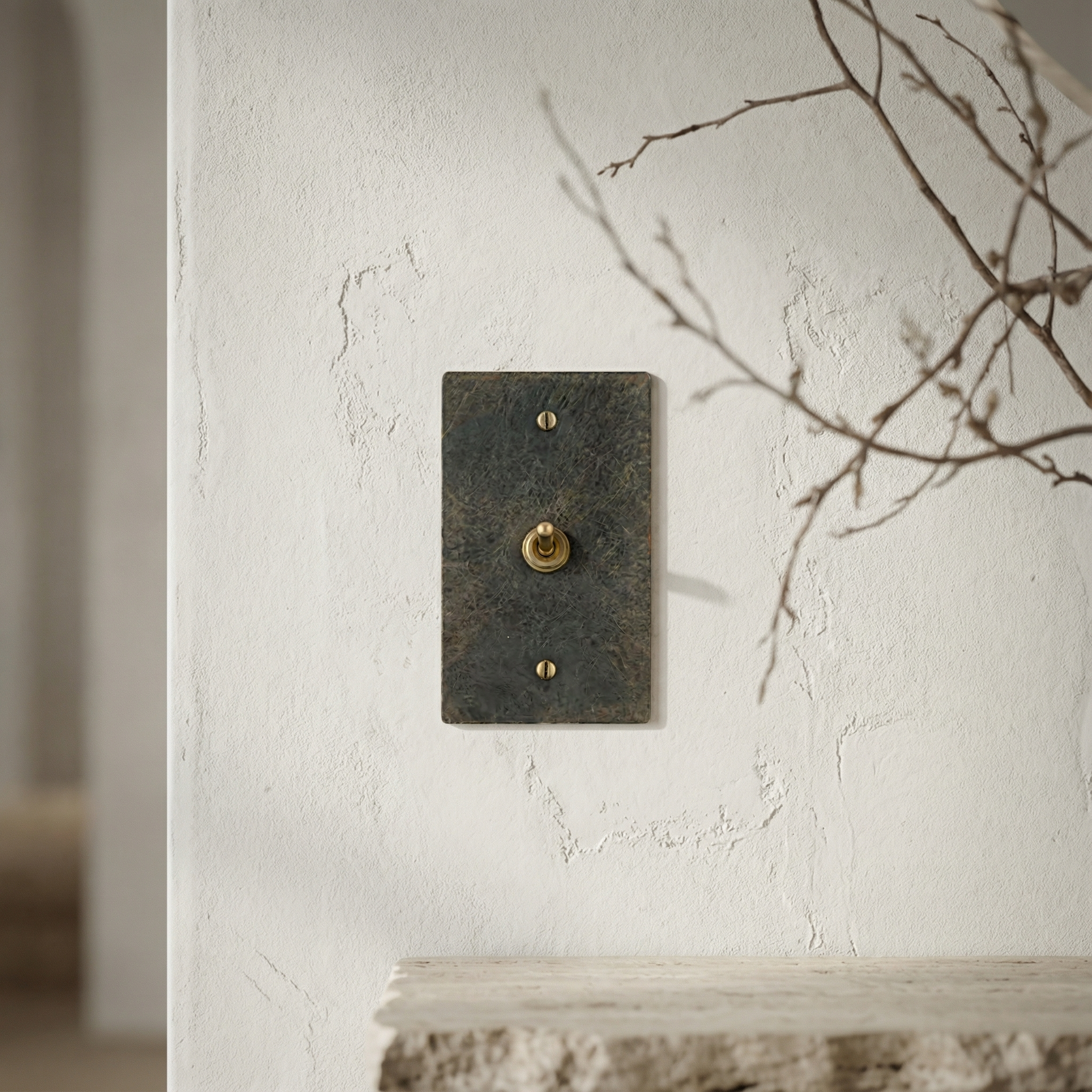 antique brass 1 gang vintage toggle switch plate on a textured wall, embodying quiet luxury and timeless design.