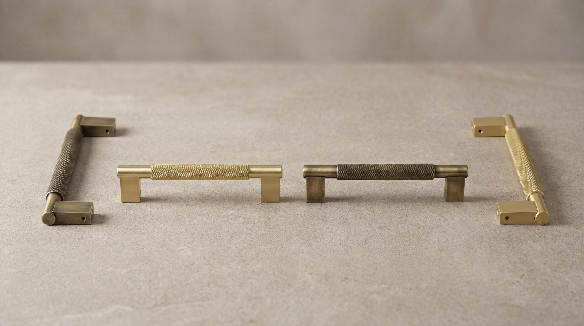 Brass Door Pulls (Grassetto): Four knurled brass handles in aged and satin finishes, embodying lasting luxury.