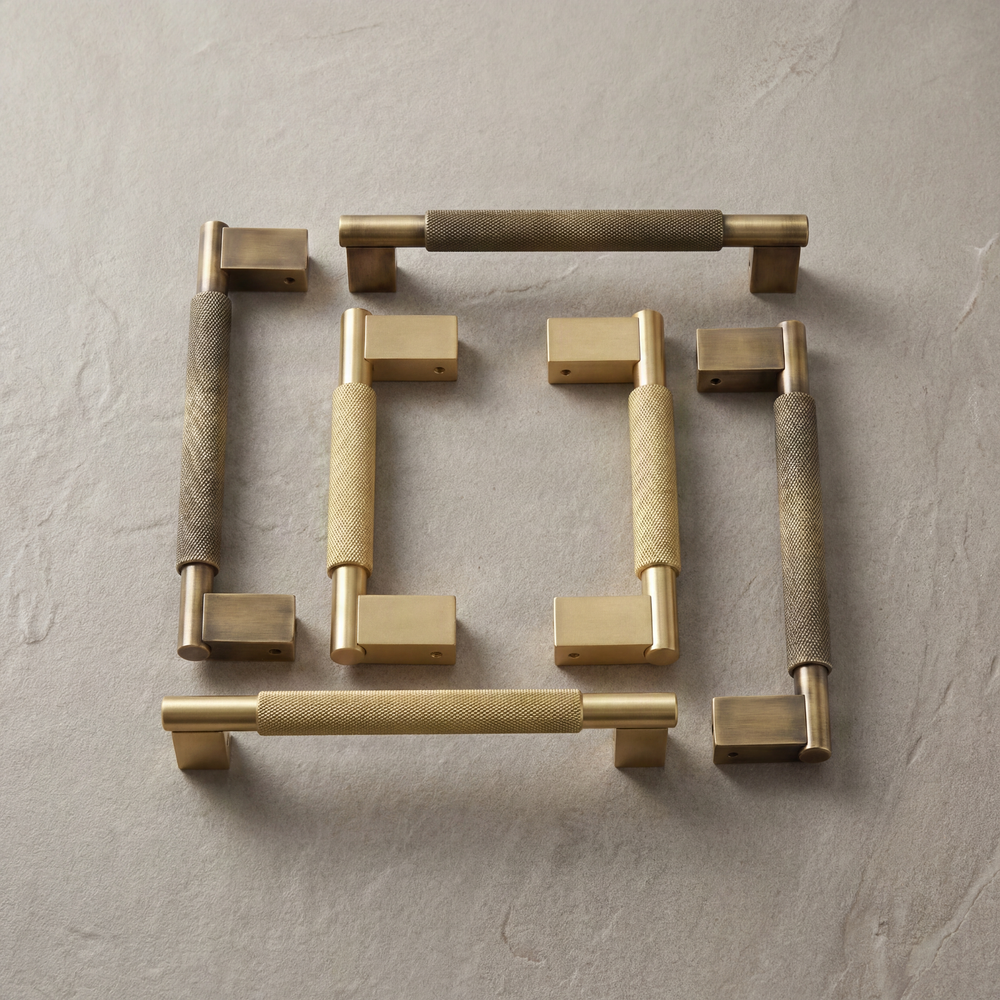 Timeless knurled brass door pulls, rich patina, satin sheen.