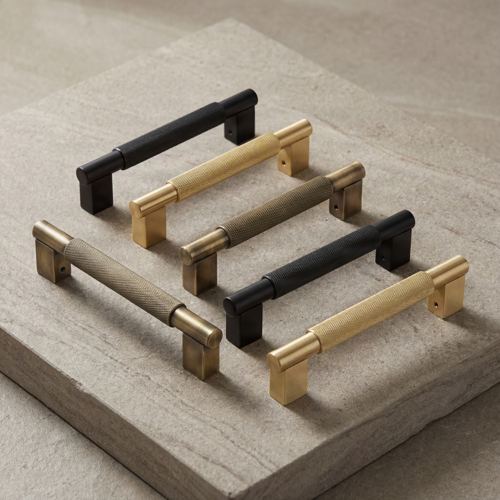 Timeless knurled brass and black door pulls.