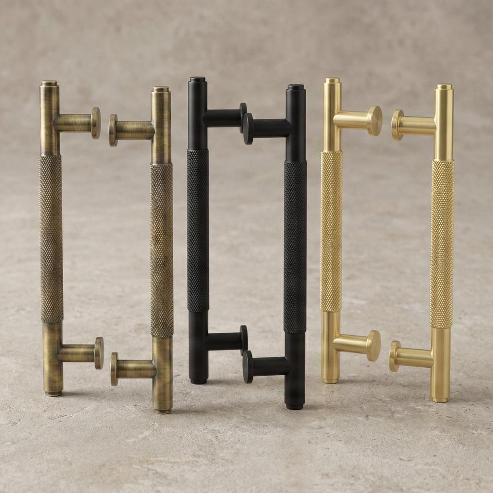 Knurled long door pulls in aged brass, matte black, and satin brass