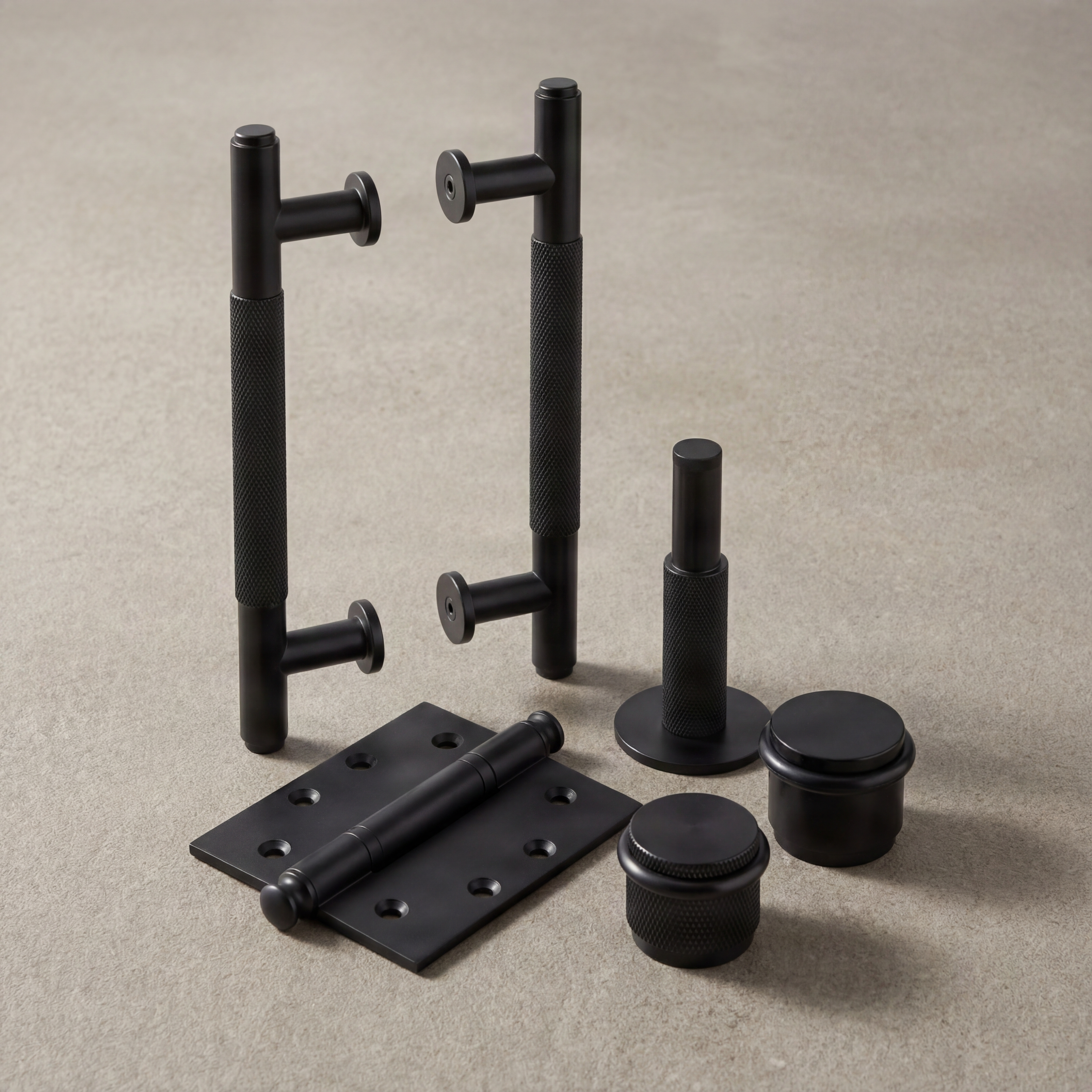 Luxury matte black knurled door pulls, hinge, door stops.
