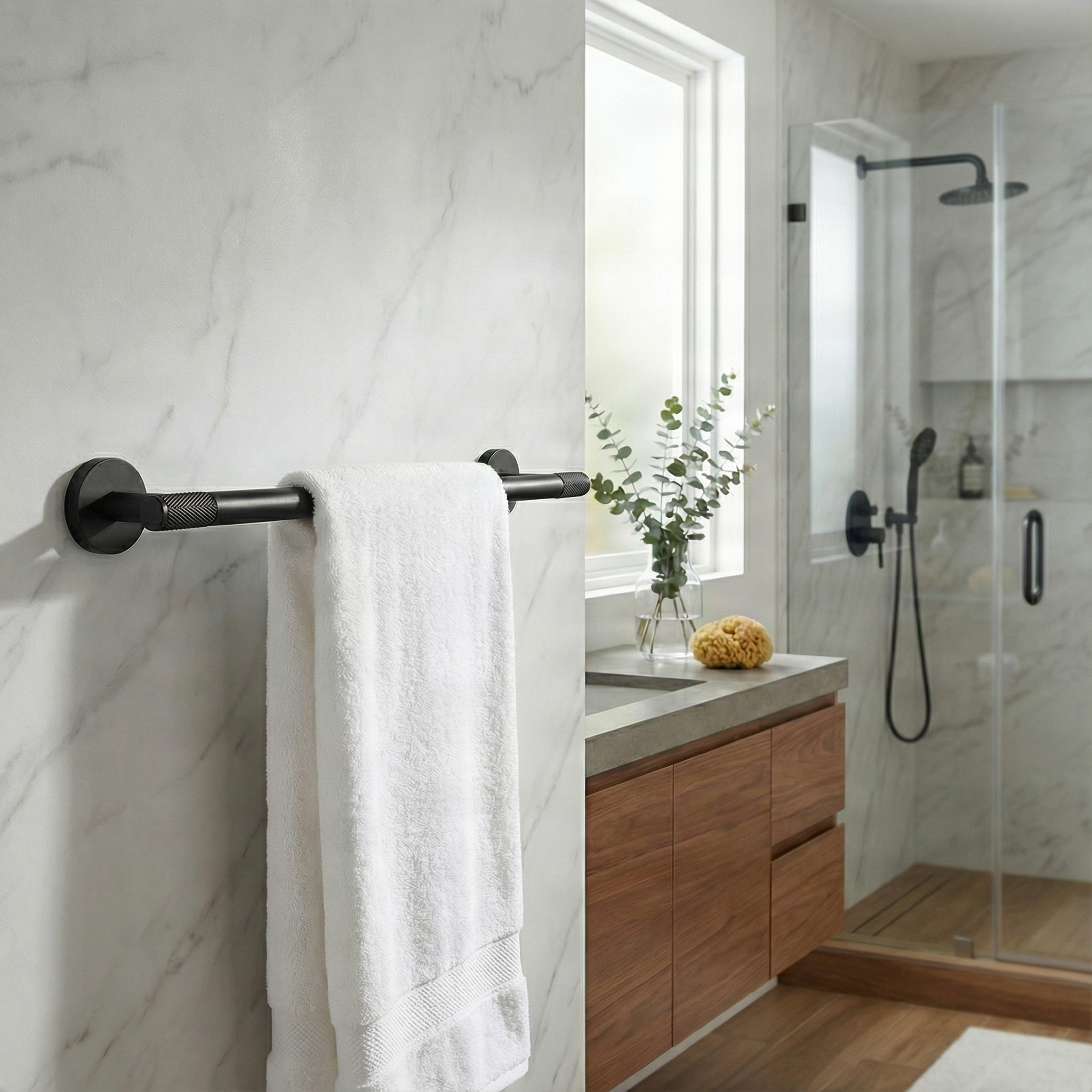 Timeless matte black knurled brass bathroom 24 inch towel bar on elegant marble wall.