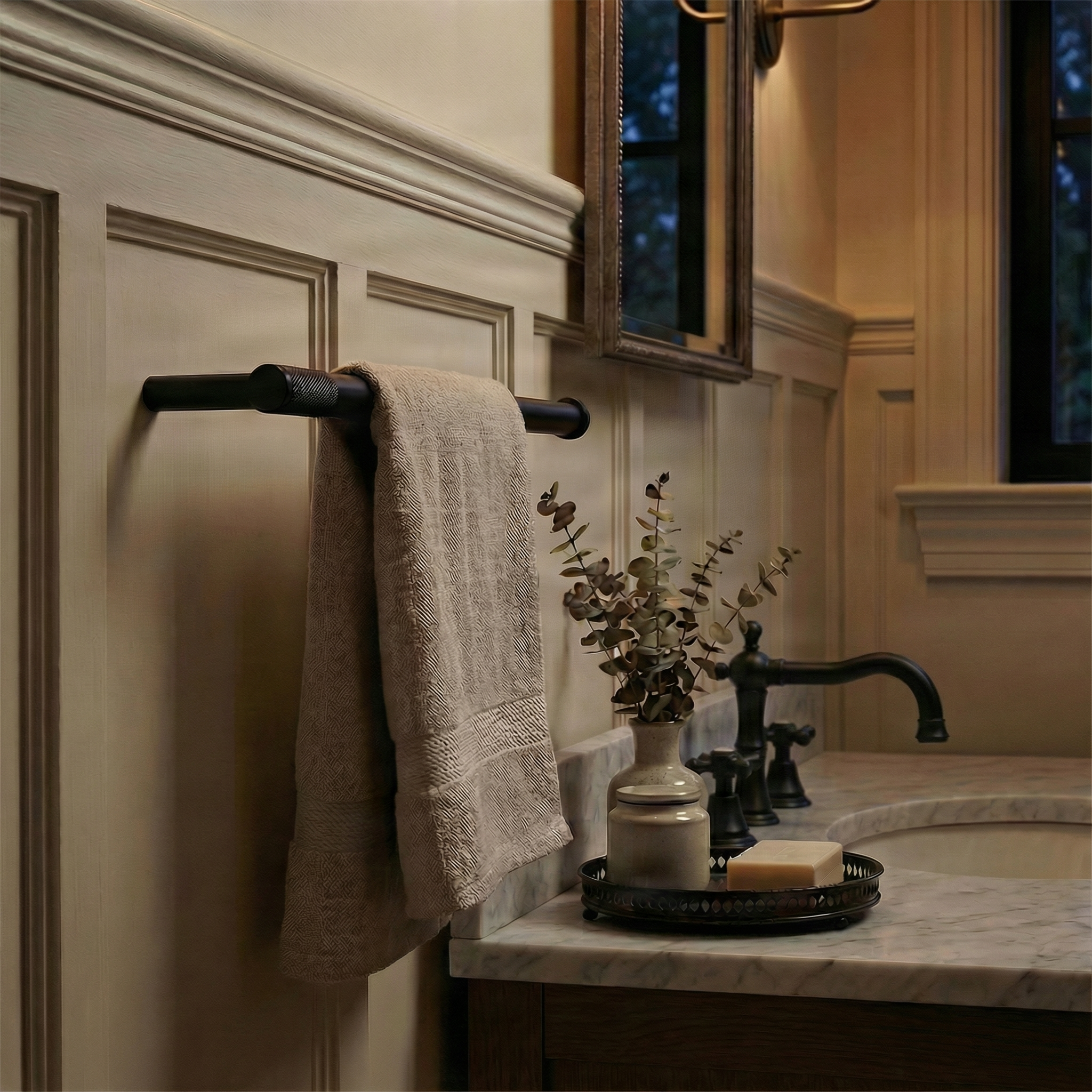Elegant bathroom with knurled matte black 11 inch towel bar holding a linen towel on paneled walls.