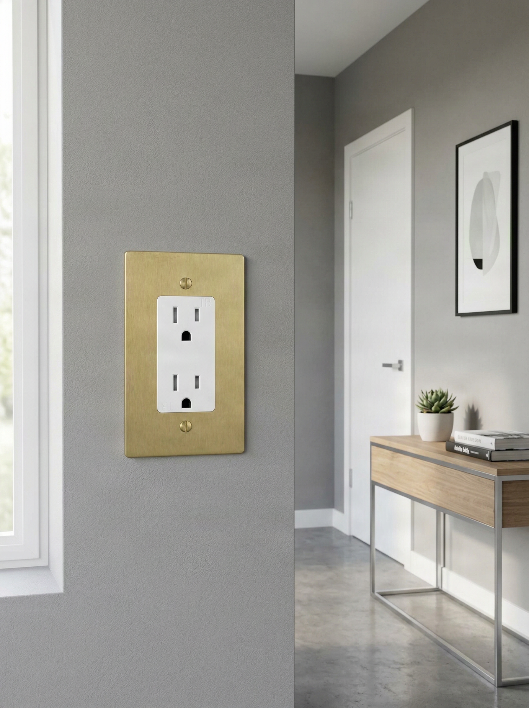 A satin brass 1 gang decora switch plate elevates a quiet, modern interior with subtle texture.