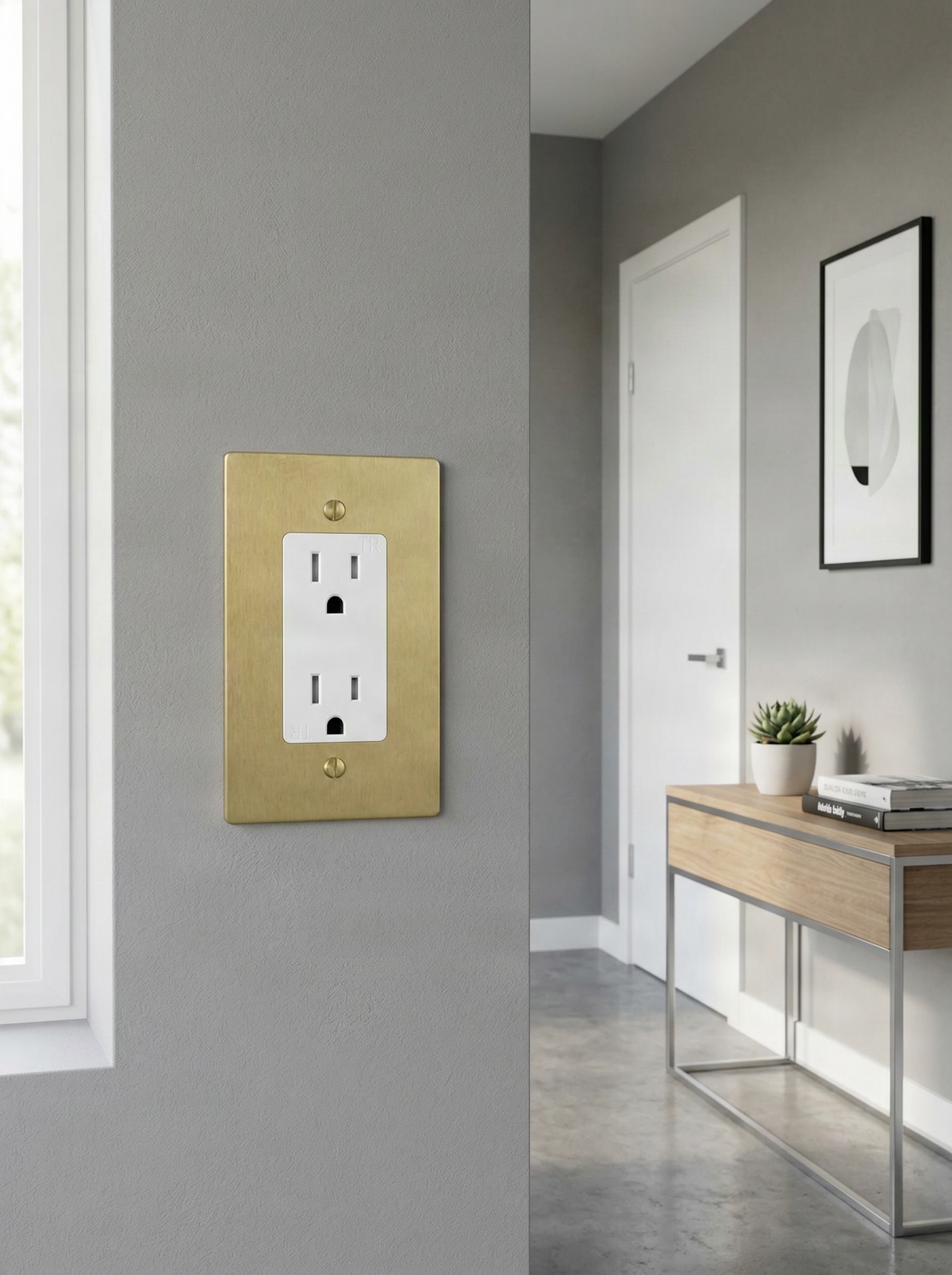 A satin brass 1 gang decora switch plate elevates a quiet, modern interior with subtle texture.