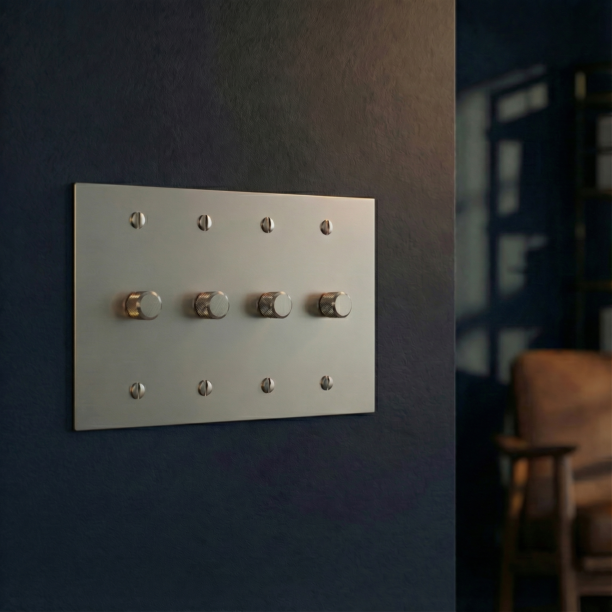 Timeless satin nickel 4 gang dimmer switch plate enhances a refined, textured navy wall in a luxurious room.