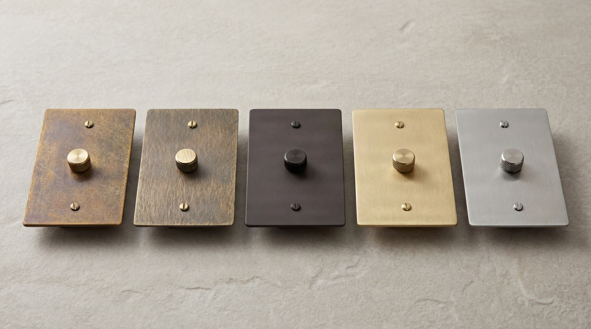 Luxury Metal Workz Single Pole Dimmer Switches: brass, black, and nickel finishes with knurled knobs, reflecting timeless craftsmanship.